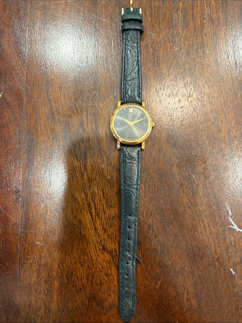 Movado Gold Case Black Dial Black Leather Strap Watch